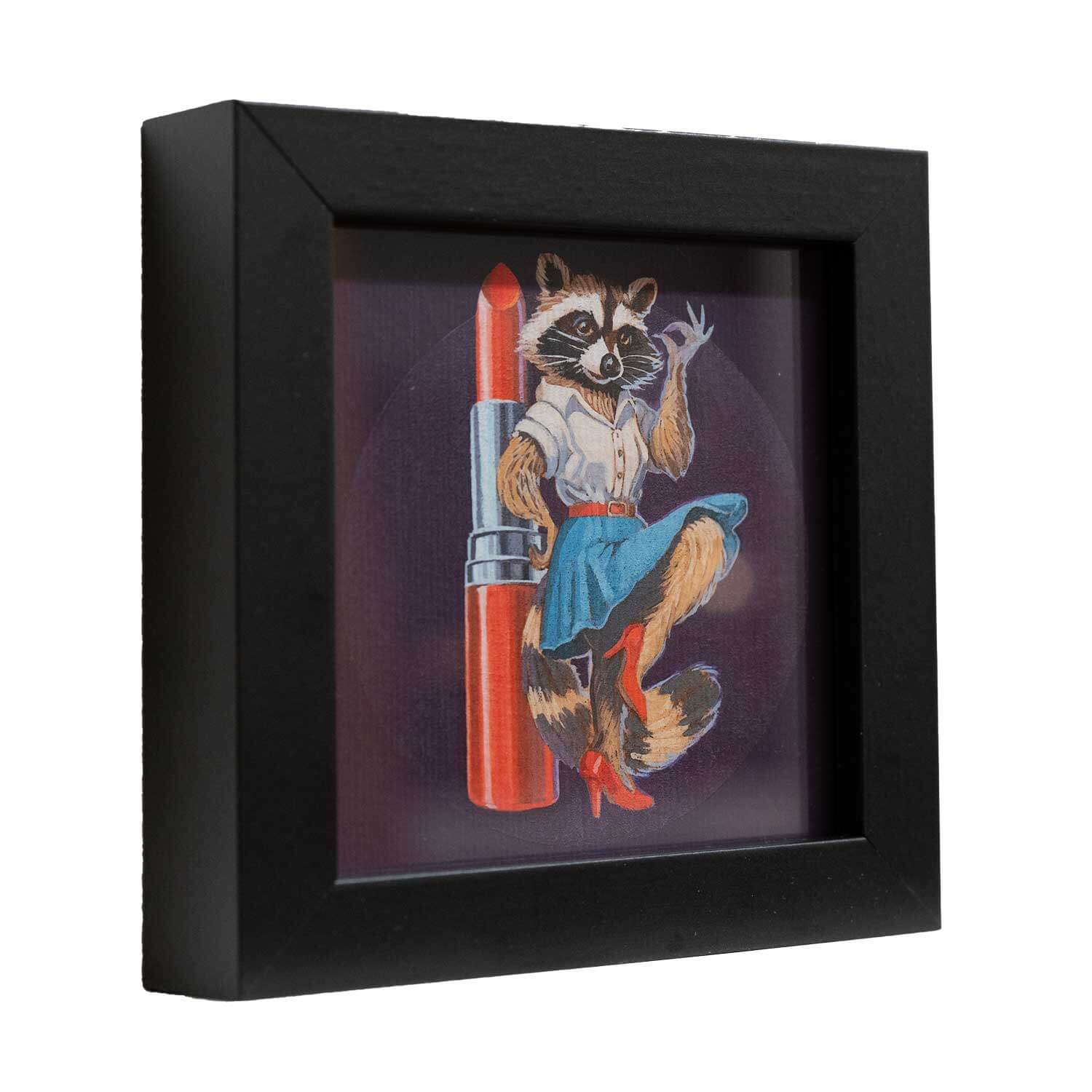 Framed art print of a stylish raccoon with lipstick, adding fun charm to any space, perfect for girls who love cute decor.