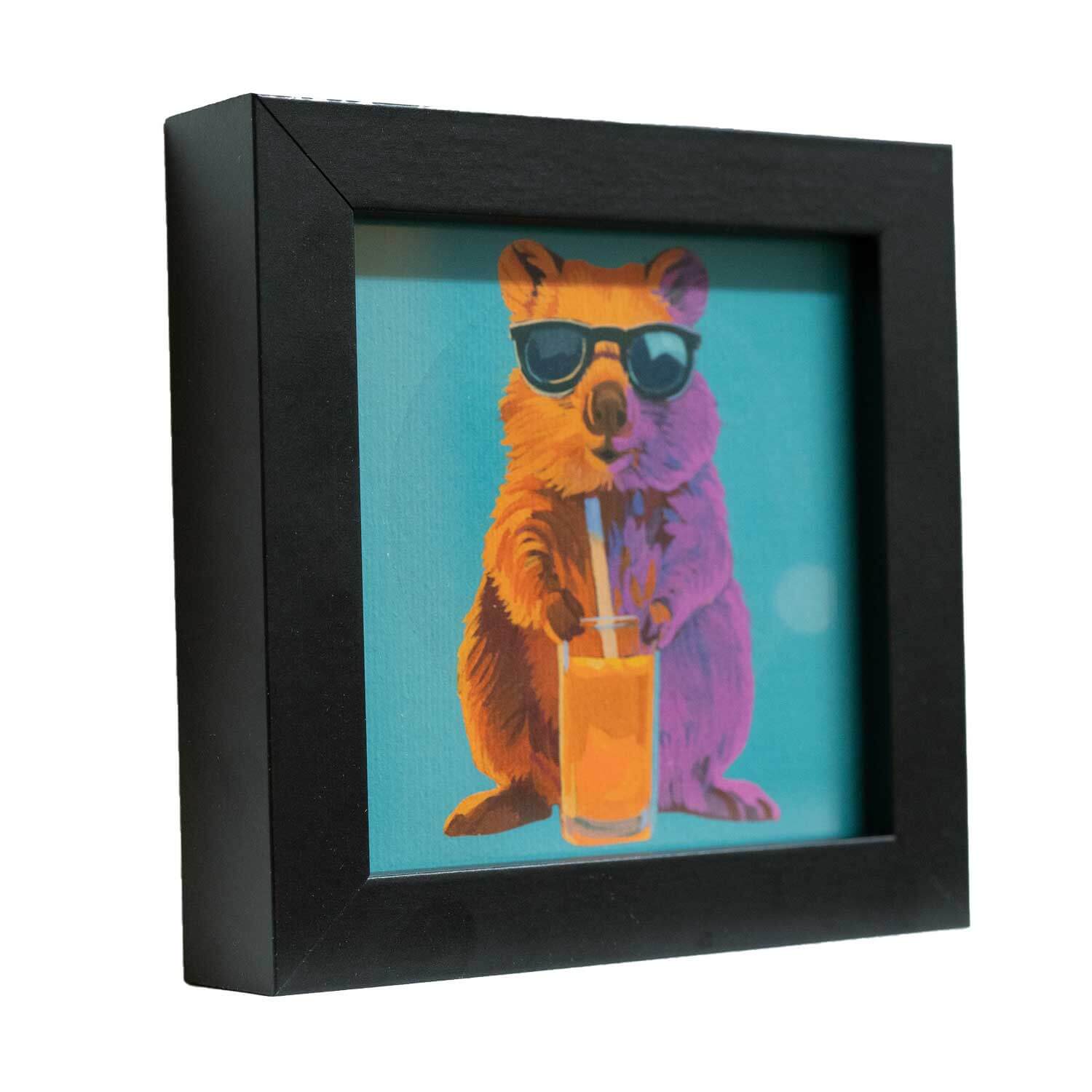 Quokka art print in a sleek black frame, wearing sunglasses and holding a drink, perfect for brightening any space.