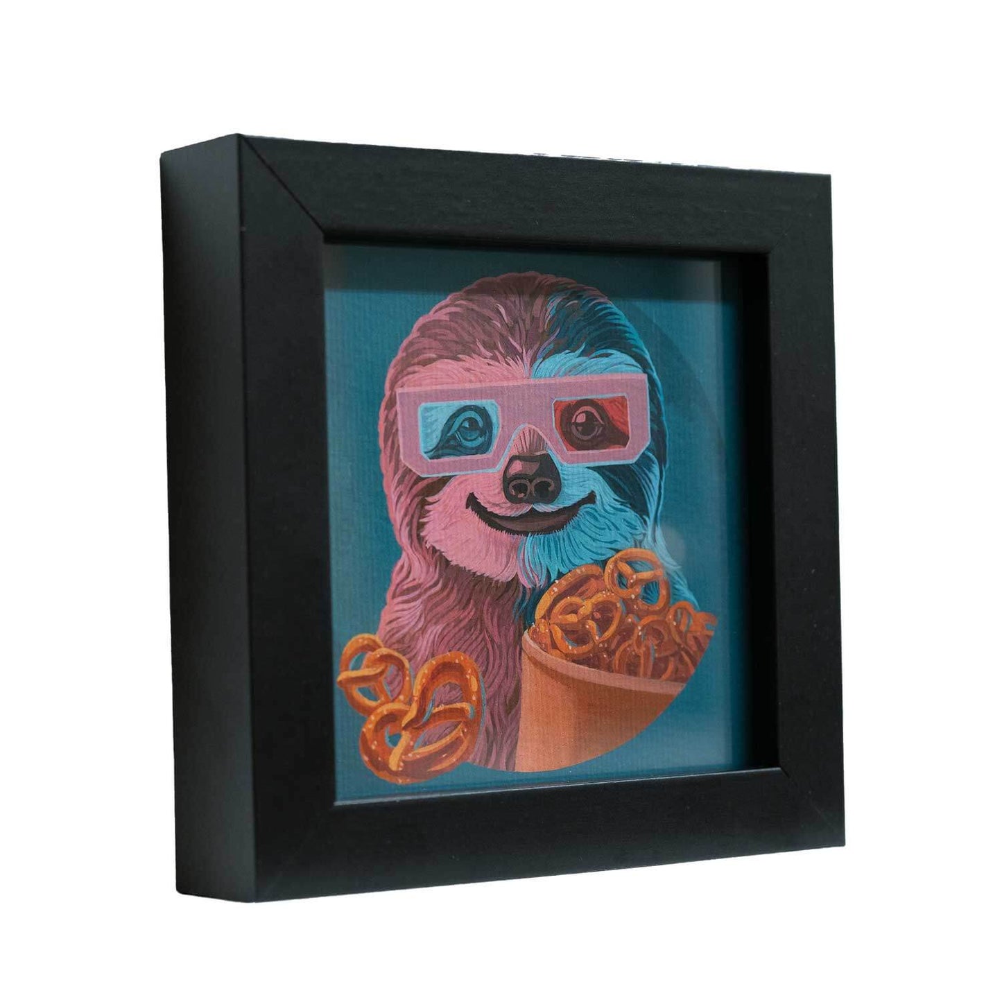 Cute sloth with pretzels in stylish black frame, perfect for brightening any corner!