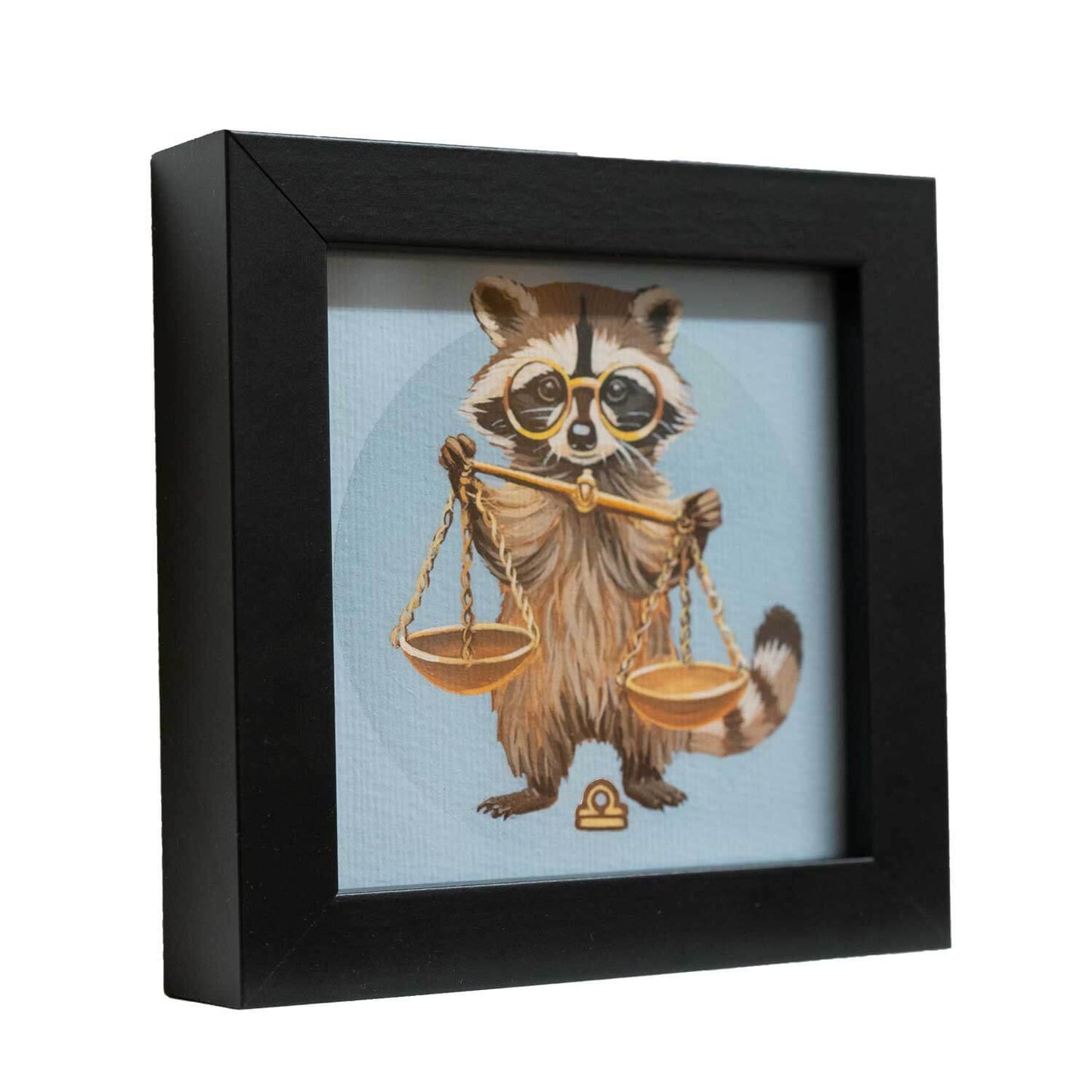 Cute raccoon balancing scales in a stylish black frame, perfect for Libra zodiac decor, 10x10 cm fine art print.