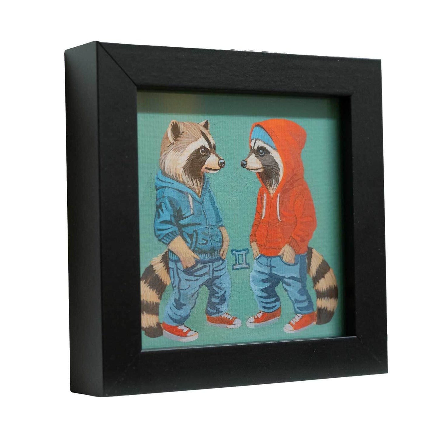 Cute framed art print of two raccoons representing the Gemini zodiac sign, perfect for home decor.