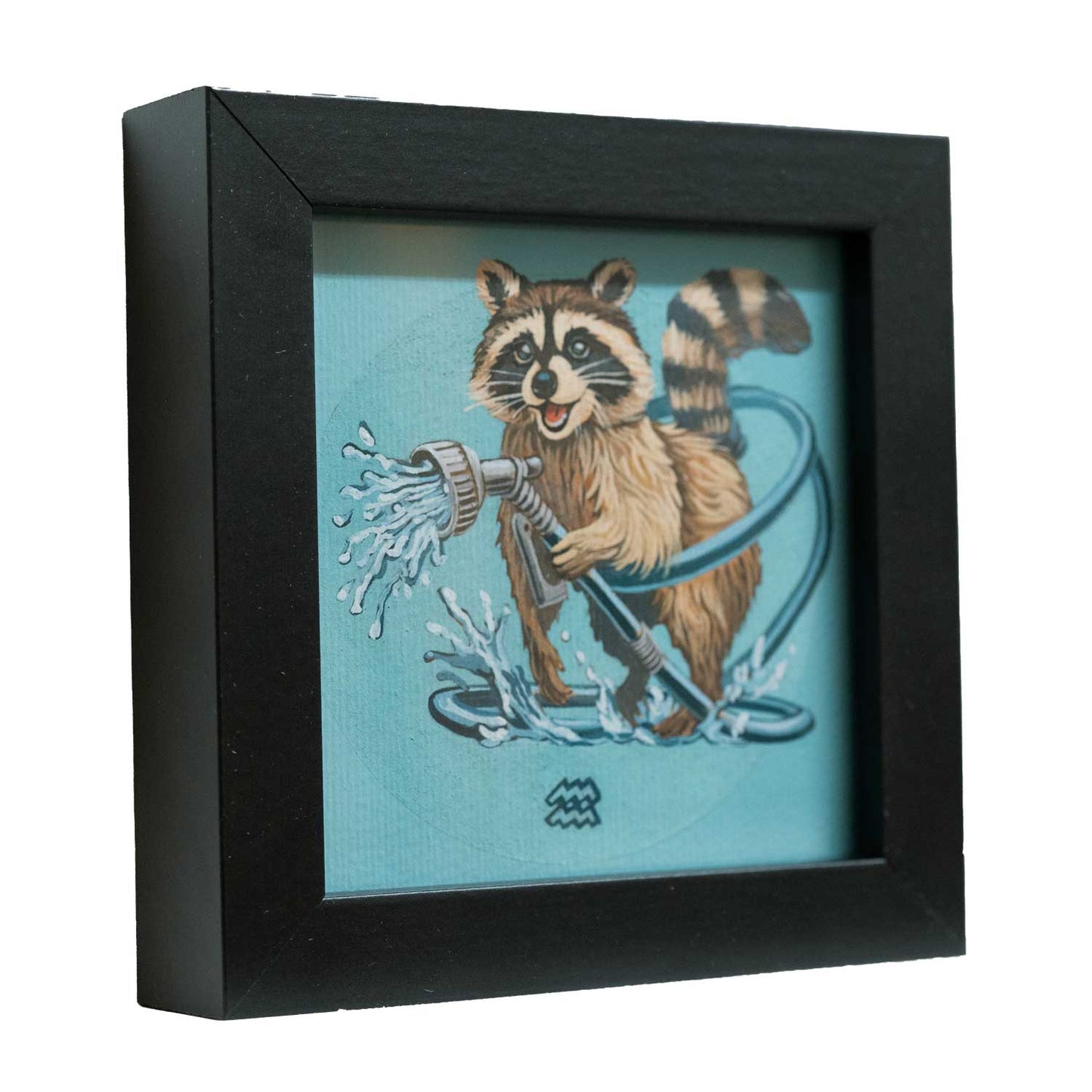 Cute raccoon with water hose in a stylish black frame, perfect for adding flair to any space!